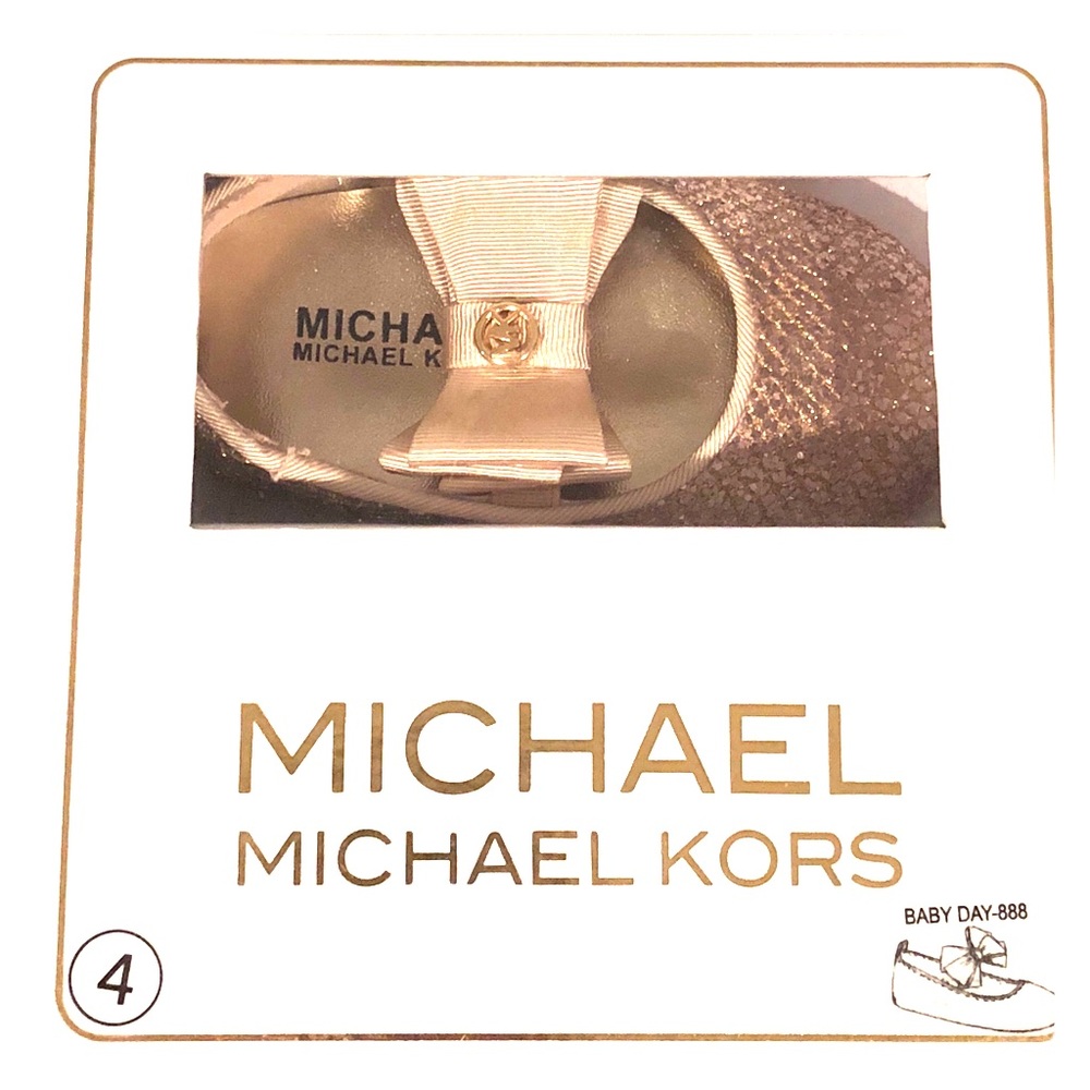 Michael Kors baby slip on gold shoes